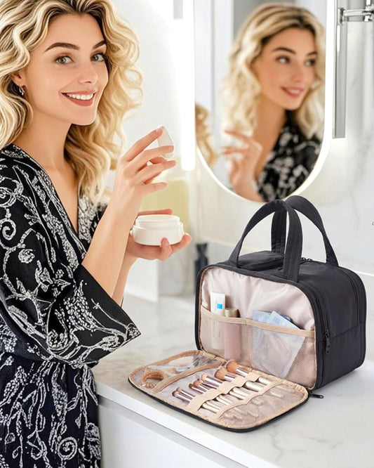 two main zippered compartments with elastic straps to secure bottles upright