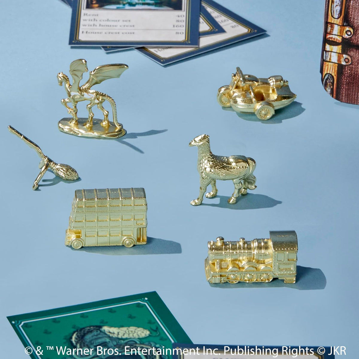 28 title deed cards, 2 dice, a cardboard prefect badge, and an instruction game guide included