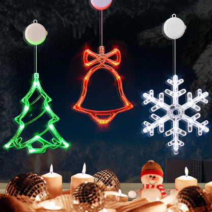 3-pack led window lights in christmas-themed shapes (jingle bell, christmas tree, snowflake, reindeer, stocking, snowman, santa hat, wreath, gift box)