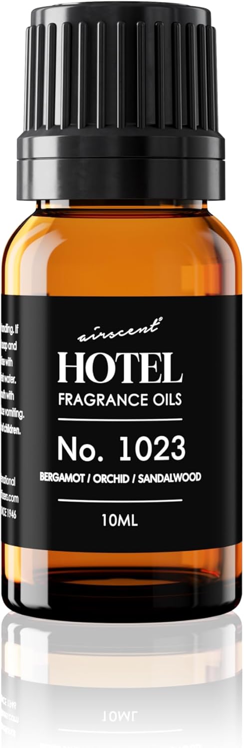 baccarat hotel-inspired fragrance profile with bergamot, orchid, sandalwood, cedar, jasmine, musk, ambergris and iris notes