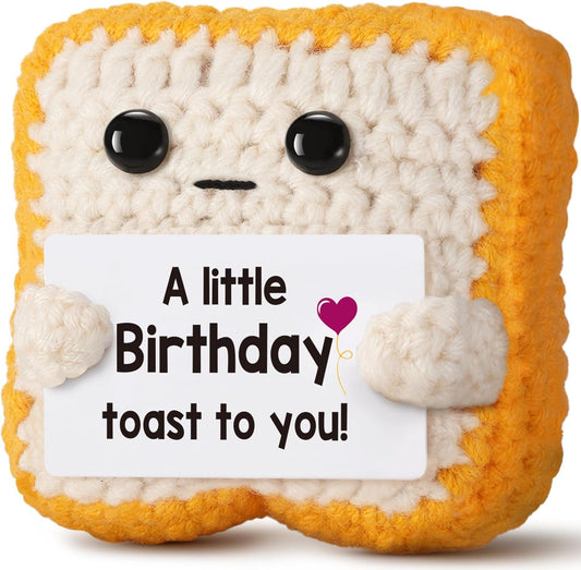built-in greeting card message ('a little birthday toast to you') attached to the crochet piece