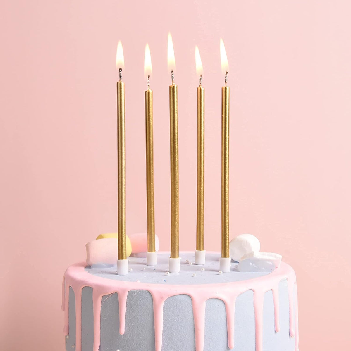 each candle includes a drip-protective candle holder