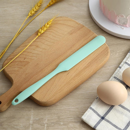 long skinny 9.5-inch handle designed to reach into jars, bottles, and deep containers