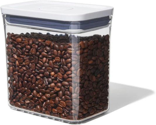 push-button airtight seal that doubles as a lid handle