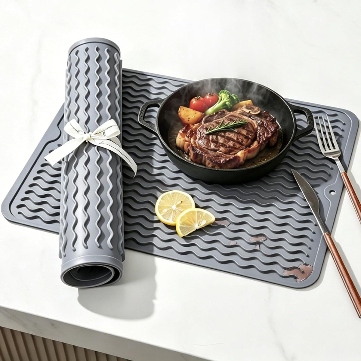 ribbed top surface that channels and traps drips away from dishes