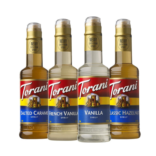 set of four 12.7 fl oz glass bottles covering vanilla, salted caramel, classic hazelnut, and french vanilla