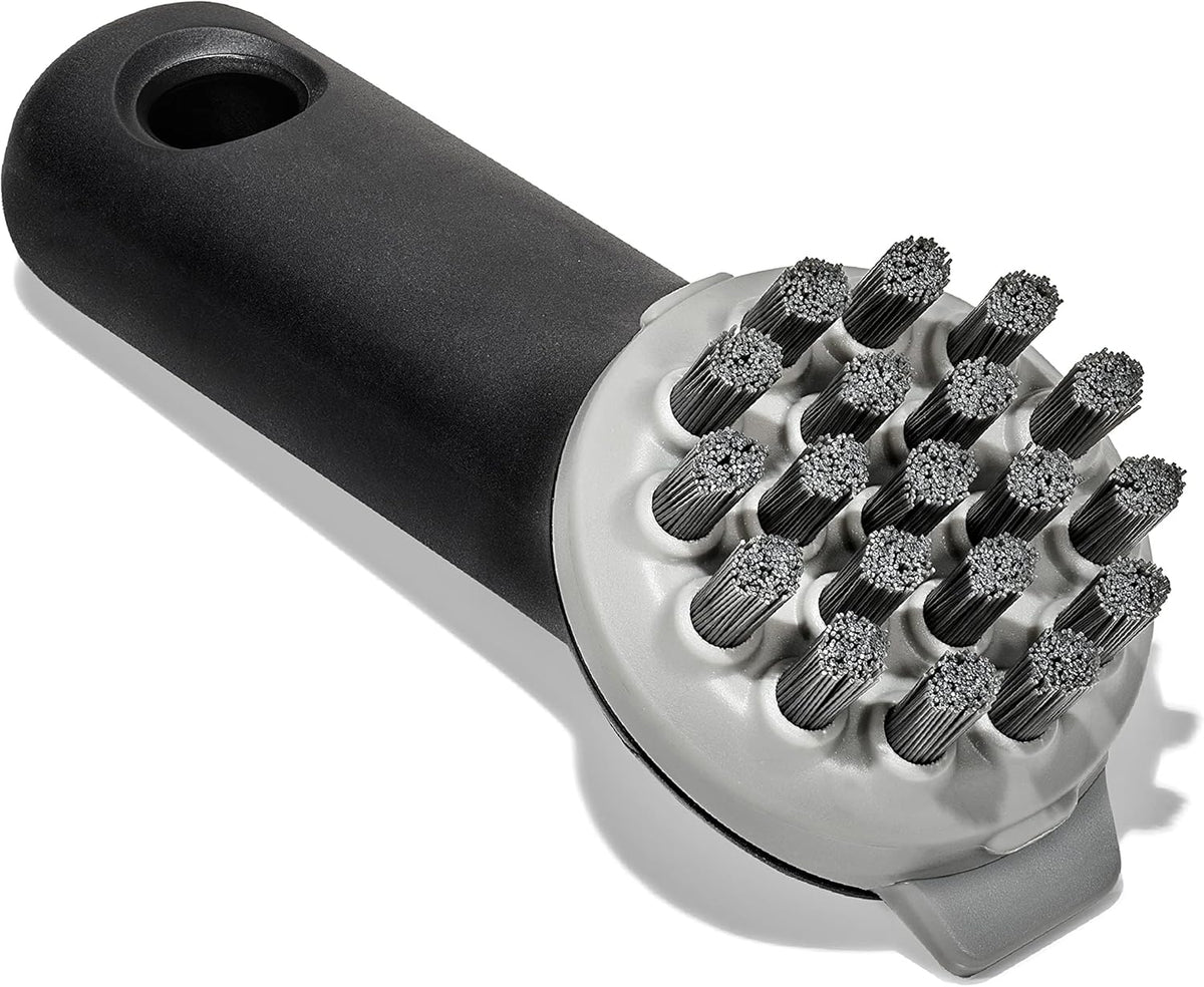 smart bristle pattern engineered for both flat and ridged cookware surfaces