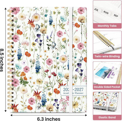spiral-bound hardcover construction with elastic closure and double-sided storage pocket