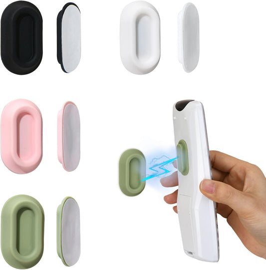 strong neodymium-style magnet paired with a slot cradle to grip the remote securely